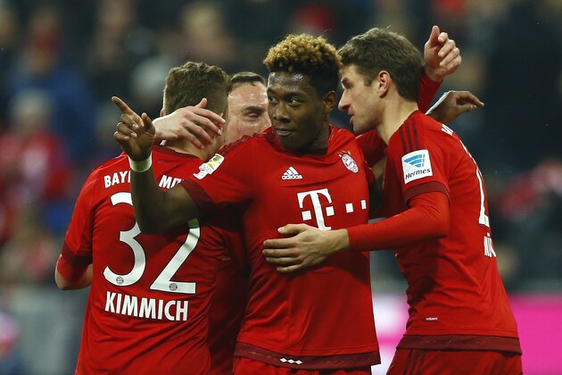 Bayern's Thomas Mueller, right, celebrates with teammates Joshua Kimmich, left, Franck Ribery, background, and David Alaba after scoring his side's third goal during the German Bundesliga soccer match between FC Bayern Munich and SV Werder Bremen at the Allianz Arena stadium in Munich, Germany, Saturday, March 12, 2016. (AP Photo/Matthias Schrader)