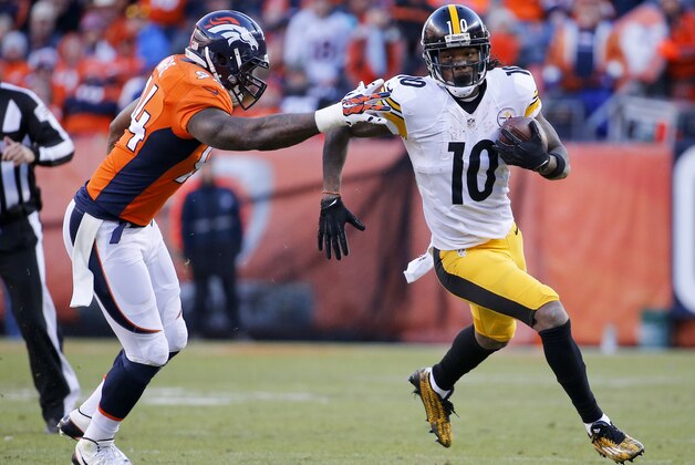Pittsburgh Steelers wide receiver Martavis Bryant, runs past Denver Broncos outside linebacker DeMarcus Ware during the first half in an NFL football divisional playoff game, Sunday, Jan. 17, 2016, in Denver. (AP Photo/Jack Dempsey)