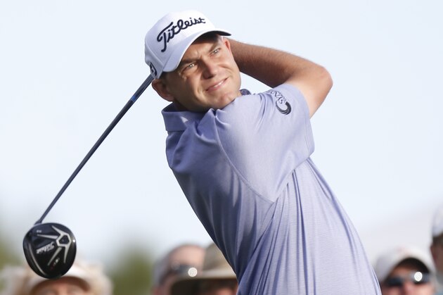 Bill Haas tees off on the 10th hole during the first round of the Valspar Championship golf tournament Thursday, March 10, 2016, in Palm Harbor, Fla. (AP Photo/Brian Blanco)