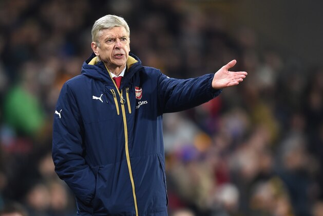 HULL, ENGLAND - MARCH 08:  Arsene Wenger, Manager of Arsenal reacts during the Emirates FA Cup Fifth Round Replay match between Hull City and Arsenal at KC Stadium on March 8, 2016 in Hull, England.  (Photo by Michael Regan/Getty Images)