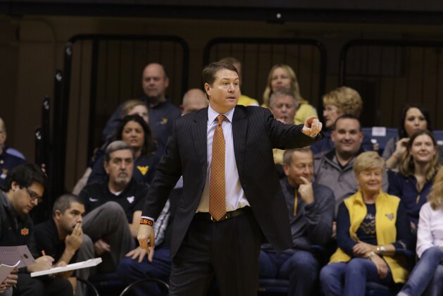 Oklahoma State head coach Travis Ford during the first/second half of an NCAA college basketball game, Saturday, Jan, 9, 2016, in Morgantown, W.Va. (AP Photo/Raymond Thompson)