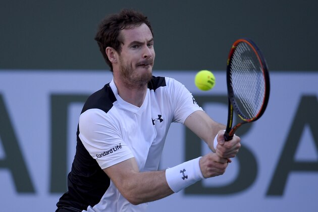 Andy Murray, of Great Britain, returns a hit from Marcel Granollers during their match at the BNP Paribas Open tennis tournament, Saturday, March 12, 2016, in Indian Wells, Calif. (AP Photo/Mark J. Terrill)