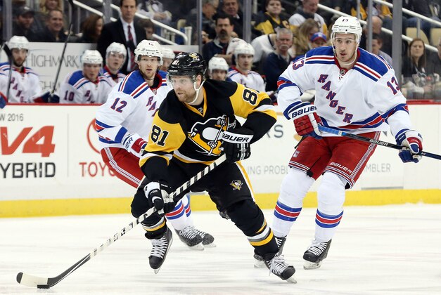Mar 3, 2016; Pittsburgh, PA, USA; Pittsburgh Penguins right wing Phil Kessel (81) skates with the puck against the New York Rangers during the second period at the CONSOL Energy Center. The Penguins won 4-1. Mandatory Credit: Charles LeClaire-USA TODAY Sports