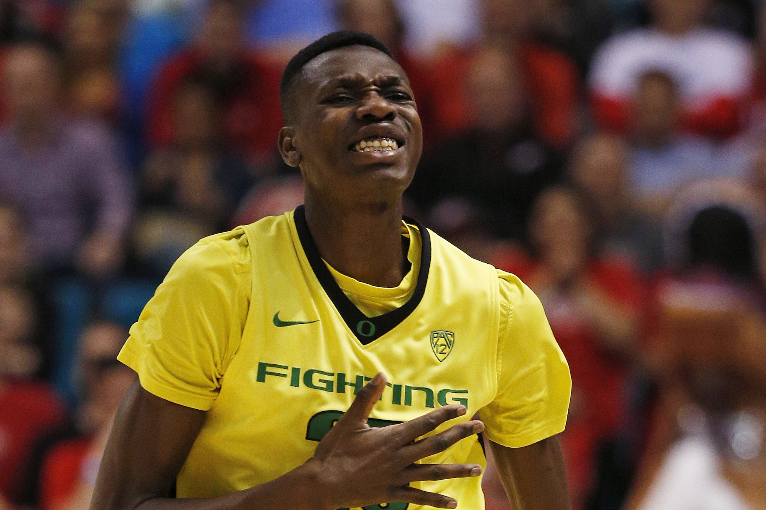 Oregon forward Chris Boucher reacts after scoring a 3-point shot against Utah during the first half of an NCAA college basketball game in the championship of the Pac-12 men's tournament Saturday, March 12, 2016, in Las Vegas. (AP Photo/John Locher) Oregon forward Chris Boucher reacts after scoring a 3-point shot against Utah during the first half of an NCAA college basketball game in the championship of the Pac-12 men's tournament Saturday, March 12, 2016, in Las Vegas. (AP Photo/John Locher)
