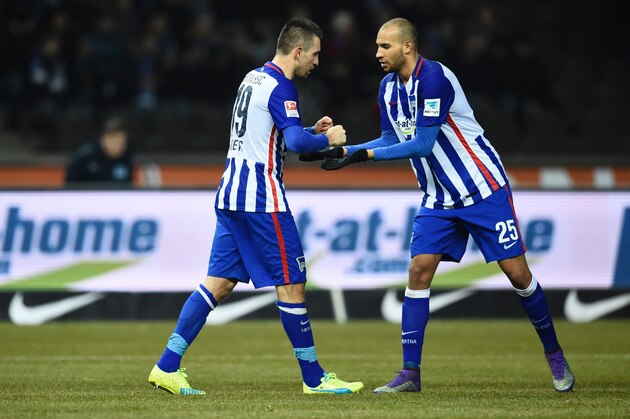 Hertha's Bosnian forward Vedad Ibisevic (L) celebrates scoring the 1-0 goal with his team-mate defender John Anthony Brooks during the German first division Bundesliga football match, Hertha Berlin v Schalke 04, at the Olympic stadium in Berlin on March 11, 2016.  / AFP / ODD ANDERSEN / RESTRICTIONS: DURING MATCH TIME: DFL RULES TO LIMIT THE ONLINE USAGE TO 15 PICTURES PER MATCH AND FORBID IMAGE SEQUENCES TO SIMULATE VIDEO. == RESTRICTED TO EDITORIAL USE == FOR FURTHER QUERIES PLEASE CONTACT DFL DIRECTLY AT + 49 69 650050
        (Photo credit should read ODD ANDERSEN/AFP/Getty Images)