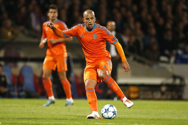 LYON, FRANCE - SEPTEMBER 29: Sofiane Feghouli of Valencia CF in action during the UEFA Champions league match between Olympic Lyonnais (OL) and Valencia CF at Stade de Gerland on September 29, 2015 in Lyon, France. (Photo by Jean Catuffe/Getty Images)