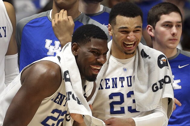 Kentucky's Jamal Murray (23) and Alex Poythress (22) celebrate in the final minutes of the second half of an NCAA college basketball game against Georgia in the Southeastern Conference tournament in Nashville, Tenn., Saturday, March 12, 2016. Kentucky won 93-80. (AP Photo/John Bazemore)