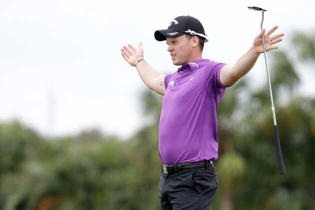 Danny Willett of England, reacts to a missed putt on the fifth hole during the first round of the Cadillac Championship golf tournament, Thursday, March 3, 2016, in Doral, Fla. (AP Photo/Lynne Sladky)