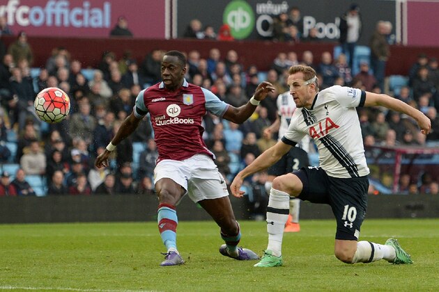 Tottenham Hotspur's English striker Harry Kane (R) scores his team's second goal during the English Premier League football match between Aston Villa and Tottenham Hotspur at Villa Park in Birmingham, central England on March 13, 2016. / AFP / OLI SCARFF / RESTRICTED TO EDITORIAL USE. No use with unauthorized audio, video, data, fixture lists, club/league logos or 'live' services. Online in-match use limited to 75 images, no video emulation. No use in betting, games or single club/league/player publications.  /         (Photo credit should read OLI SCARFF/AFP/Getty Images)