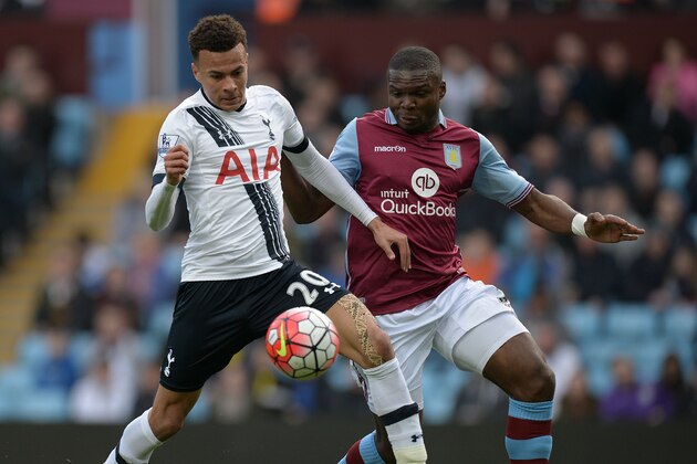 Tottenham Hotspur's English midfielder Dele Alli (L) vies with Aston Villa's Ivorian-born Danish defender Jores Okore during the English Premier League football match between Aston Villa and Tottenham Hotspur at Villa Park in Birmingham, central England on March 13, 2016. / AFP / OLI SCARFF / RESTRICTED TO EDITORIAL USE. No use with unauthorized audio, video, data, fixture lists, club/league logos or 'live' services. Online in-match use limited to 75 images, no video emulation. No use in betting, games or single club/league/player publications.  /         (Photo credit should read OLI SCARFF/AFP/Getty Images)