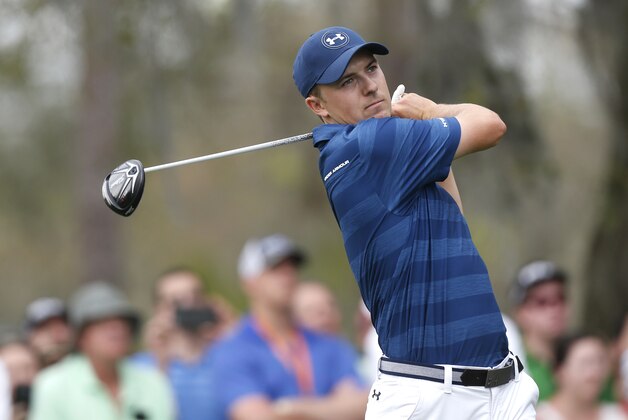 Jordan Spieth takes his tee shot in the second hole during the final round of the Valspar Championship golf tournament Sunday, March 13, 2016, in Palm Harbor, Fla. (AP Photo/Brian Blanco)