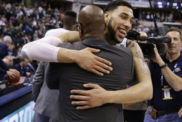 Michigan State's Denzel Valentine (45) celebrates after an NCAA college basketball game against Purdue in the finals at the Big Ten Conference tournament, Sunday, March 13, 2016, in Indianapolis. Michigan State won 66-62. (AP Photo/Michael Conroy)