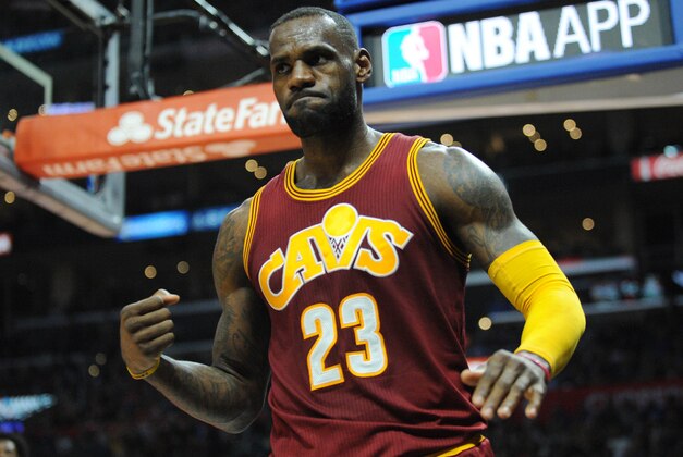 March 13, 2016; Los Angeles, CA, USA; Cleveland Cavaliers forward LeBron James (23) reacts after he draws a foul against the Los Angeles Clippers during the first half at Staples Center. Mandatory Credit: Gary A. Vasquez-USA TODAY Sports
