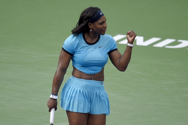 Serena Williams celebrates winning her match against Yulia Putintseva  at the BNP Paribas Open tennis tournament, Sunday, March 13, 2016, in Indian Wells, Calif. (AP Photo/Mark J. Terrill)