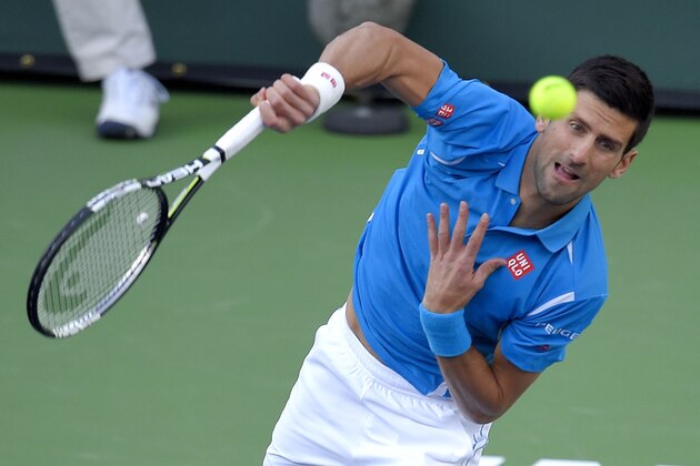 Novak Djokovic, of Serbia, serves to Bjorn Fratangelo during their match at the BNP Paribas Open tennis tournament, Sunday, March 13, 2016, in Indian Wells, Calif. (AP Photo/Mark J. Terrill)