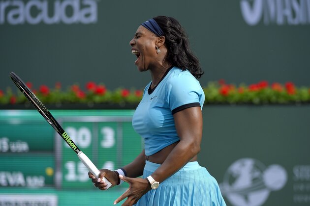Serena Williams reacts to losing a point to Yulia Putintseva during their match at the BNP Paribas Open tennis tournament, Sunday, March 13, 2016, in Indian Wells, Calif. (AP Photo/Mark J. Terrill)