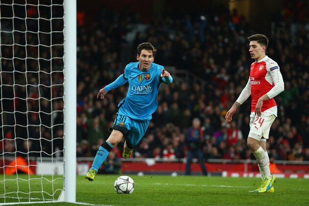 LONDON, ENGLAND - FEBRUARY 23: Lionel Messi of Barcelona celebrates after scoring the opening goal during the UEFA Champions League round of 16 first leg match between Arsenal and Barcelona on February 23, 2016 in London, United Kingdom.  (Photo by Paul Gilham/Getty Images)