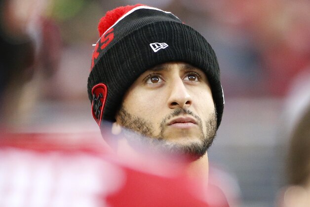 San Francisco 49ers quarterback Colin Kaepernick watches during the second half of an NFL football game against the St. Louis Rams in Santa Clara, Calif., Sunday, Jan. 3, 2016. (AP Photo/Tony Avelar)