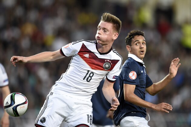 France midfielder Bilal Boutobba (R) vies with Germany goalkeeper Constantin Frommann (L) during the 2015 UEFA Euro Cup final football match between France and Germany in Burgas on May 22, 2015.  AFP PHOTO / DIMITAR DILKOFF        (Photo credit should read DIMITAR DILKOFF/AFP/Getty Images)