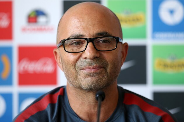 Chilean national football team, Argentinian Jorge Sampaoli, gestures as he speaks during a press conference in Santiago, Chile, on January 13, 2016. Chile coach Jorge Sampoali appears on the verge of quitting six months after guiding La Roja to the Copa America, with the Argentine claiming he is being held 'hostage' by the federation. AFP PHOTO/CLAUDIO REYES / AFP / Claudio Reyes        (Photo credit should read CLAUDIO REYES/AFP/Getty Images)