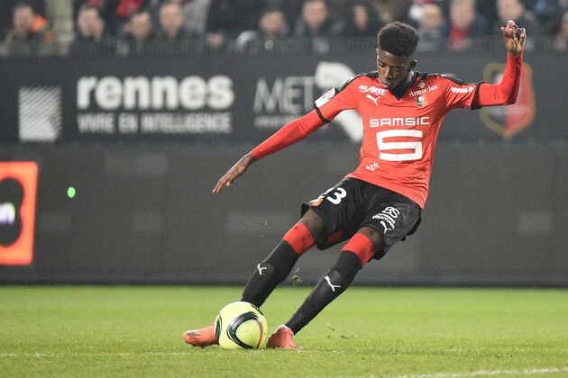 Rennes' French forward Ousmane Dembele kicks the ball   during the French L1 football match Rennes against Lyon on March 13, 2016 at the Roazhon park stadium in Rennes, western France. AFP PHOTO / DAMIEN MEYER / AFP / DAMIEN MEYER        (Photo credit should read DAMIEN MEYER/AFP/Getty Images)