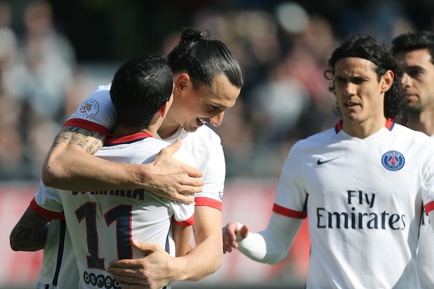 TROYES, FRANCE - MARCH 13: Zlatan Ibrahimovic of PSG celebrates his second goal with Angel Di Maria and Edinson Cavani of PSG during the French Ligue 1 match between ESTAC Troyes and Paris Saint-Germain (PSG) at Stade de l'Aube on March 13, 2016 in Troyes, France. (Photo by Jean Catuffe/Getty Images)