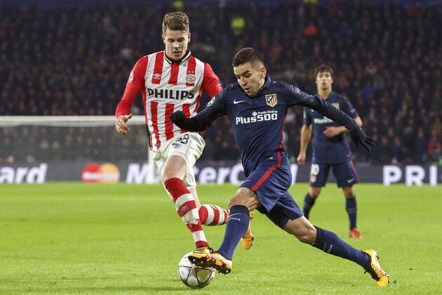 (L-R) Marco van Ginkel of PSV,  Angel Correa of Club Atletico de Madrid during the UEFA Champions League Round of 16, First leg match between PSV Eindhoven and Atletico Madrid on February 24, 2016 at the Philips stadium in Eindhoven, The Netherlands.(Photo by VI Images via Getty Images)