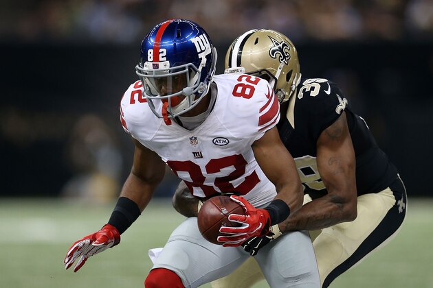 NEW ORLEANS, LA - NOVEMBER 01:  Brandon Browner #39 of the New Orleans Saints tries to bring down Rueben Randle #82 of the New York Giants during the second quarter of a game at the Mercedes-Benz Superdome on November 1, 2015 in New Orleans, Louisiana.  (Photo by Chris Graythen/Getty Images)