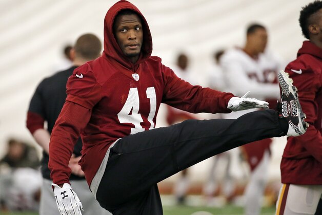 Washington Redskins cornerback Will Blackmon (41) stretches during practice at the team's NFL football training facility at Redskins Park, Thursday, Jan. 7, 2016 in Ashburn, Va. The Washington Redskins will play the Green Bay Packers in a wild-card game on Sunday. (AP Photo/Alex Brandon)