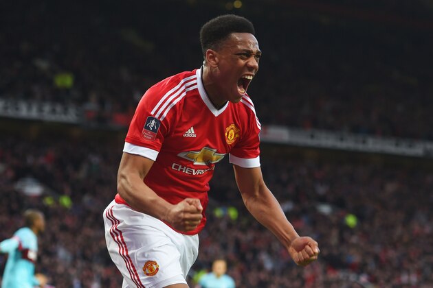 MANCHESTER, ENGLAND - MARCH 13:  Anthony Martial of Manchester United celebrates as he scores their first and equalising goal during the Emirates FA Cup sixth round match between Manchester United and West Ham United at Old Trafford on March 13, 2016 in Manchester, England.  (Photo by Michael Regan/Getty Images)