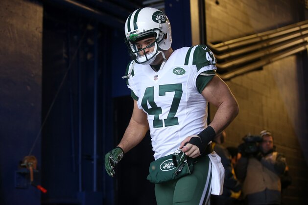 ORCHARD PARK, NY - JANUARY 3: Kellen Davis #47 of the New York Jets takes to the field through the tunnel before the start of their game against the Buffalo Bills during NFL game action at Ralph Wilson Stadium on January 3, 2016 in Orchard Park, New York. (Photo by Tom Szczerbowski/Getty Images)