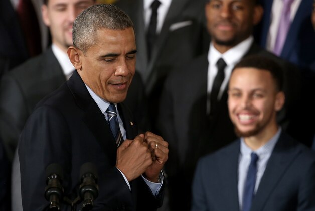 WASHINGTON, DC - FEBRUARY 04:  U.S. President Barack Obama jokes while demonstrating 'clowning' when talking about Stephen Curry (R), the 2015 National Basketball Association MVP, during an event in the East Room on February 4, 2016 in Washington, DC. Obama welcomed the 2015 NBA Champion Golden State Warriors to the White House to congratulate the team on their accomplishment.  (Photo by Win McNamee/Getty Images)