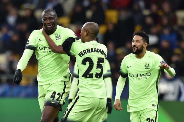 Manchester City's Ivorian midfielder Yaya Toure (L) celebrates after scoring during the UEFA Champions league round of 16, first leg, football match FC Dynamo Kyiv vs Manchester City  FC at the NSC Olimpiski stadium in Kiev on February 24, 2016.  AFP PHOTO / SERGEI SUPINSKY / AFP / SERGEI SUPINSKY        (Photo credit should read SERGEI SUPINSKY/AFP/Getty Images)