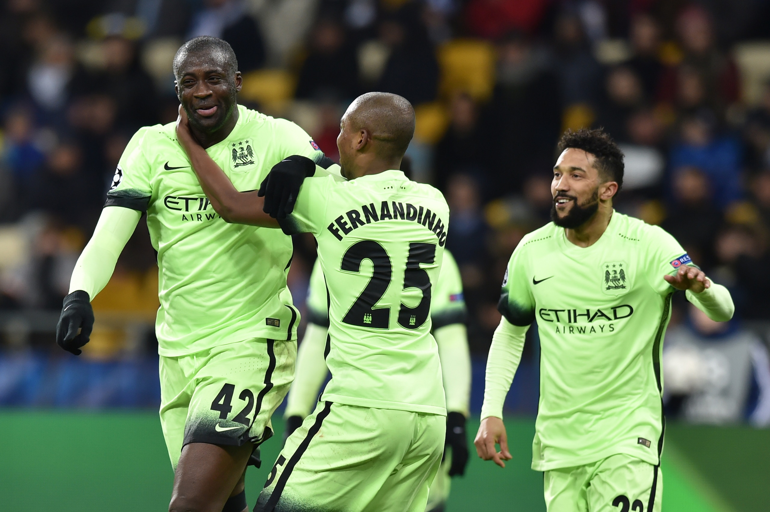 Manchester City's Ivorian midfielder Yaya Toure (L) celebrates after scoring during the UEFA Champions league round of 16, first leg, football match FC Dynamo Kyiv vs Manchester City  FC at the NSC Olimpiski stadium in Kiev on February 24, 2016.  AFP PHOTO / SERGEI SUPINSKY / AFP / SERGEI SUPINSKY        (Photo credit should read SERGEI SUPINSKY/AFP/Getty Images)