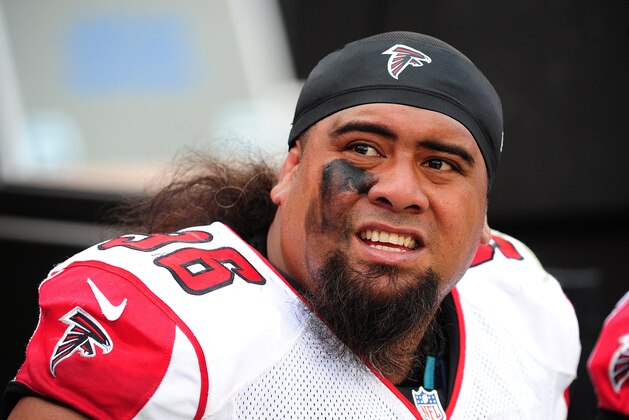 CHARLOTTE, NC - NOVEMBER 16: Paul Soliai #96 of the Atlanta Falcons watches the action against the Carolina Panthers at Bank Of America Stadium on November 16, 2014 in Charlotte, North Carolina. (Photo by Scott Cunningham/Getty Images)