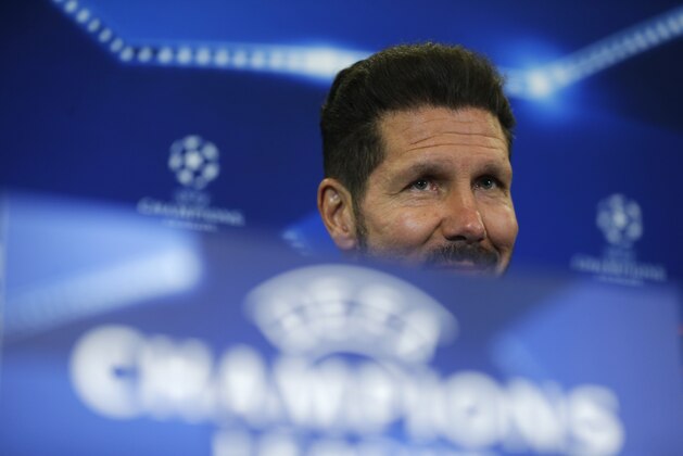 Atletico Madrid's head coach Diego Simeone smiles during a news conference at the Vicente Calderon stadium in Madrid, Monday, March 14, 2016. Atletico Madrid will play a Champions League second leg soccer match against PSV Eindhoven on Tuesday 15. (AP Photo/Francisco Seco)