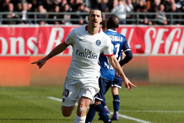 PSG's Zlatan Ibrahimovic celebrates after scoring during his League One soccer match against Troyes, in Troyes, France, Sunday, March 13, 2016. Zlatan Ibrahimovic scored four second-half goals as Paris Saint-Germain clinched its fourth straight French league title in style, pulverizing last-place Troyes 9-0 on Sunday to become champion with a record eight games to spare. (AP Photo/Thibault Camus)