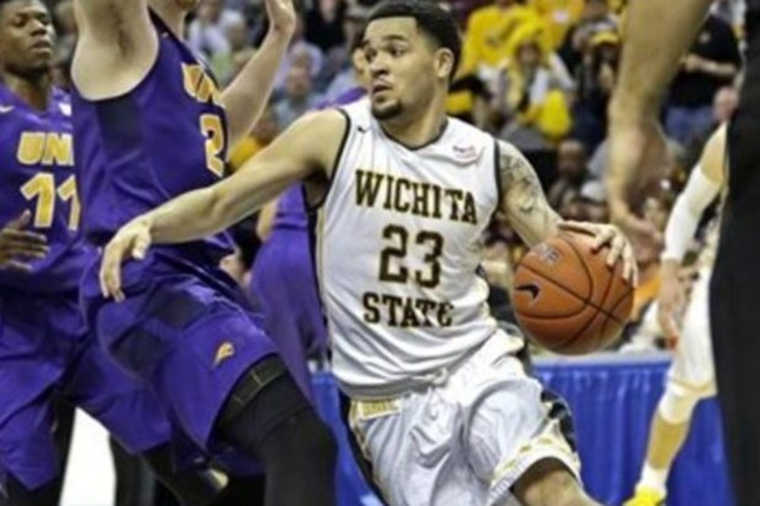 FILE- In this March 5, 2016, file photo, Wichita State's Fred VanVleet (23) drives around Northern Iowa's Klint Carlson (2) during the second half of an NCAA college basketball game in the semifinals of the Missouri Valley Conference men's tournament in St. Louis. Wichita State is one of eight teams whose tournaments are starting a little bit before the first round of the college basketball NCAA Tournament officially opens Thursday, March 17. (AP Photo/Tom Gannam, File)