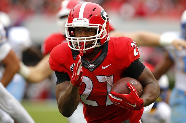 ATHENS, GA - SEPTEMBER 26: Running back Nick Chubb #27 of the Georgia Bulldogs rushes in for a touchdown in the third quarter of the game against the Southern University Jaguars on September 26, 2015 at Sanford Stadium in Athens, Georgia. The Georgia Bulldogs won 48-6. (Photo by Todd Kirkland/Getty Images)