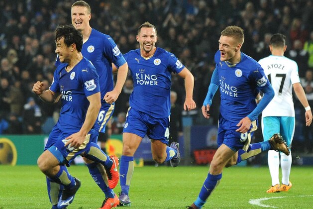 Leicester’s Shinji Okazaki, front, celebrates after scoring during the English Premier League soccer match between Leicester City and Newcastle United at the King Power Stadium in Leicester, England, Monday, March 14, 2016. (AP Photo/Rui Vieira)