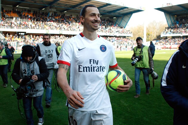 PSG's Zlatan Ibrahimovic smiles after PSG won the French league title, during their League One soccer match against Troyes, in Troyes, France, Sunday, March 13, 2016. Zlatan Ibrahimovic scored four second-half goals as Paris Saint-Germain clinched its fourth straight French league title in style, pulverizing last-place Troyes 9-0 on Sunday to become champion with a record eight games to spare. (AP Photo/Thibault Camus)