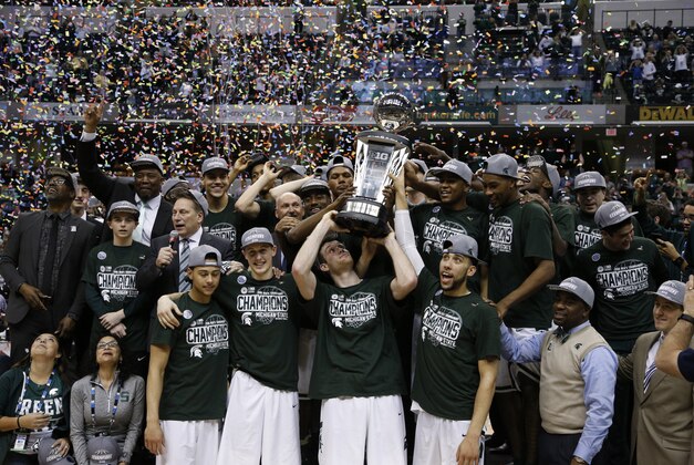 Mar 13, 2016; Indianapolis, IN, USA; Michigan State Spartans celebrate winning the Big Ten Championship against the Purdue Boilermakers during the Big Ten conference tournament at Bankers Life Fieldhouse. Michigan State defeats Purdue 66-62. Mandatory Credit: Brian Spurlock-USA TODAY Sports