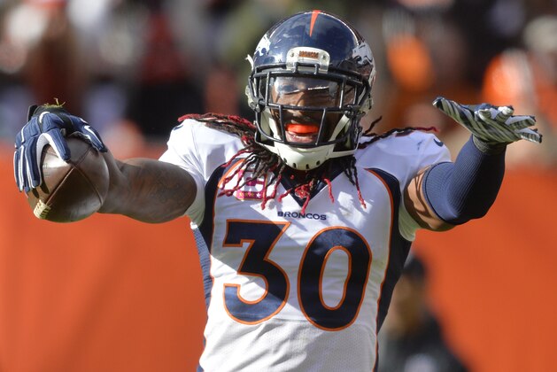 Denver Broncos strong safety David Bruton (30) celebrates an interception during the second half of an NFL football game against the Cleveland Browns, Sunday, Oct. 18, 2015, in Cleveland. (AP Photo/David Richard)