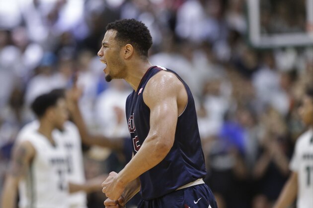 Fairleigh Dickinson's Marques Townes (15) reacts during the second half of an NCAA college basketball game in the championship of the Northeast Conference tournament against Wagner, Tuesday, March 8, 2016, in New York. Fairleigh Dickinson won 87-79. (AP Photo/Frank Franklin II)