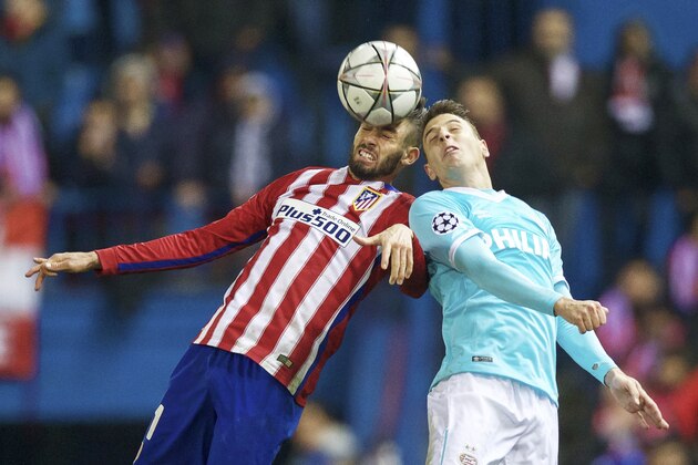 (L-R) Yannick Carrasco of Club Atletico de Madrid, Santiago Arias of PSV during the UEFA Champions League Round of 16, Second leg match between Atletico madrid and PSV Eindhoven on March 15, 2016 at the Estadio Vicente Calderón in Madrid, Spain.(Photo by VI Images via Getty Images)