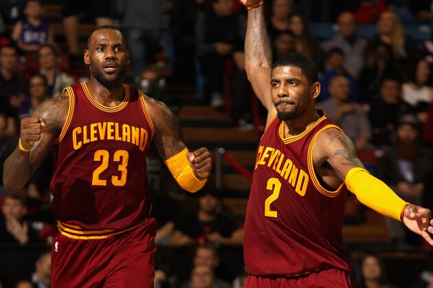 SACRAMENTO, CA - MARCH 09:  LeBron James #23 and Kyrie Irving #2 of the Cleveland Cavaliers celebrate during the fourth quarter of their game against the Sacramento Kings at Sleep Train Arena on March 9, 2016 in Sacramento, California. NOTE TO USER: User expressly acknowledges and agrees that, by downloading and or using this photograph, User is consenting to the terms and conditions of the Getty Images License Agreement.  (Photo by Ezra Shaw/Getty Images)