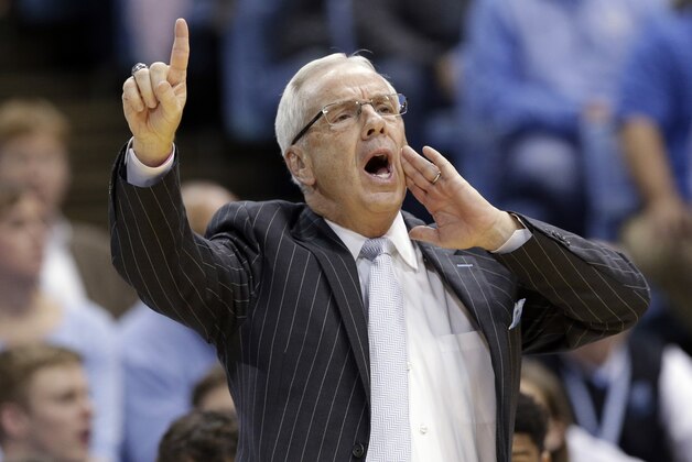 FILE - In this Dec. 1, 2015, file photo, North Carolina coach Roy Williams directs his team during the first half of an NCAA college basketball game against Maryland in Chapel Hill, N.C.  Williams' No. 7 Tar Heels were ranked No. 1 nationally and entered the season as the ACC favorite.  (AP Photo/Gerry Broome, File0