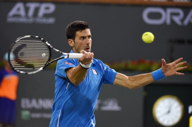 Novak Djokovic, of Serbia, returns a shot to Philipp Kohlschreiber, of Germany, at the BNP Paribas Open tennis tournament, Tuesday, March 15, 2016, in Indian Wells, Calif. (AP Photo/Mark J. Terrill) Novak Djokovic, of Serbia, returns a shot to Philipp Kohlschreiber, of Germany, at the BNP Paribas Open tennis tournament, Tuesday, March 15, 2016, in Indian Wells, Calif. (AP Photo/Mark J. Terrill)