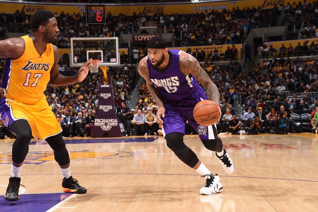 LOS ANGELES, CA - MARCH 15:  DeMarcus Cousins #15 of the Sacramento Kings drives to the basket against Roy Hibbert #17 of the Los Angeles Lakers on March 15, 2016 at STAPLES Center in Los Angeles, California. NOTE TO USER: User expressly acknowledges and agrees that, by downloading and/or using this Photograph, user is consenting to the terms and conditions of the Getty Images License Agreement. Mandatory Copyright Notice: Copyright 2016 NBAE (Photo by Andrew D. Bernstein/NBAE via Getty Images)
