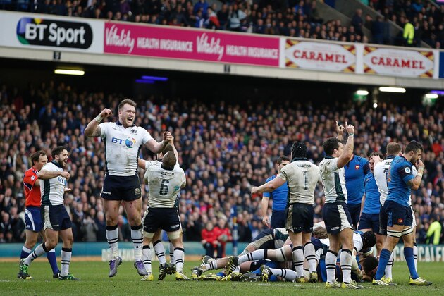 Scotland's full back Stuart Hogg (3L) jumps for joy at the final whistle during the Six Nations international rugby union match between Scotland and France at Murrayfield in Edinburgh, Scotland on March 13, 2016.  
Scotland won the match 29-18. / AFP / ADRIAN DENNIS        (Photo credit should read ADRIAN DENNIS/AFP/Getty Images)